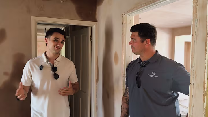 Daniel Knight talking with builder Rich Browning