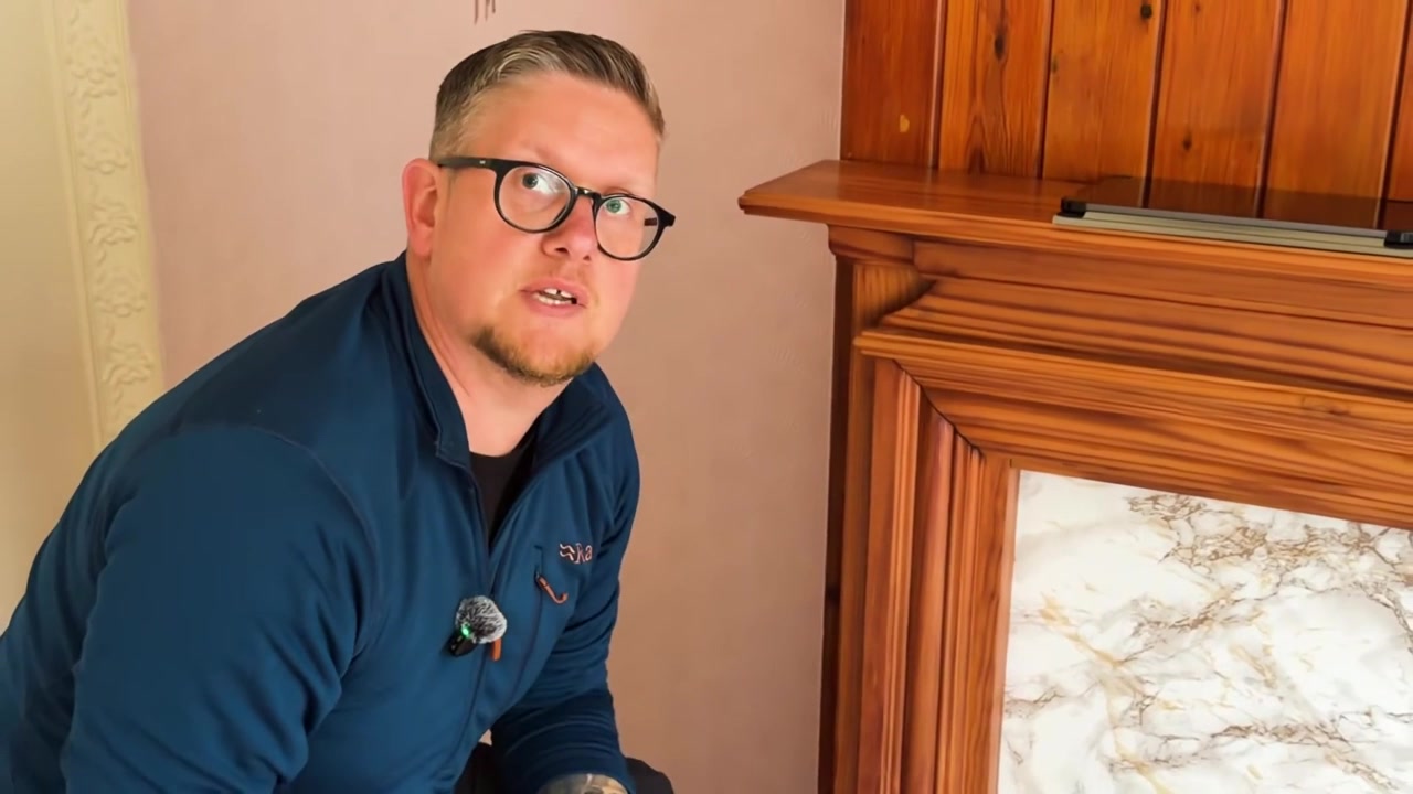 Adam Wallis explaining damp during Daniel’s property walkthrough