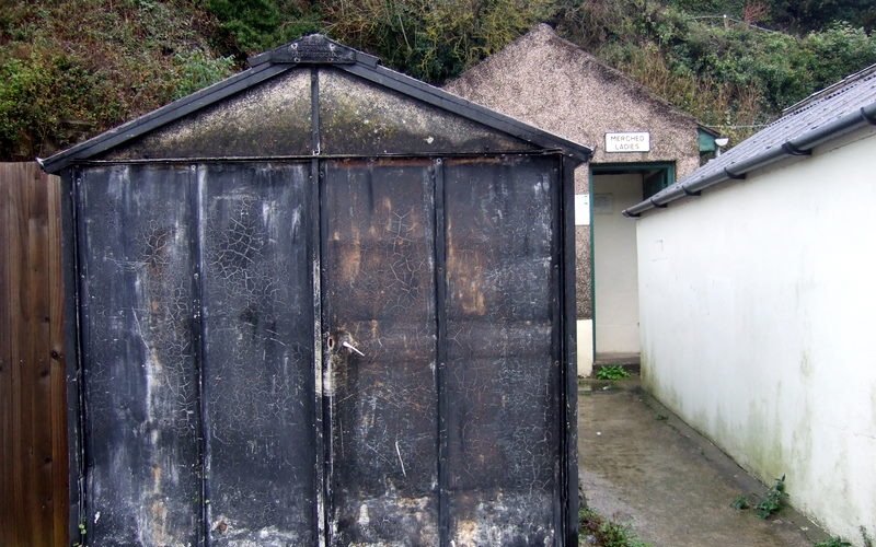 Historic prefabricated garage, illustrating older building materials