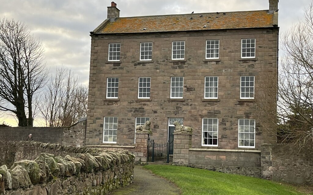 Restored stone house with sash windows in Berwick-upon-Tweed, England